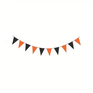 Detail of orange and black felt triangular bunting for Halloween party decoration.