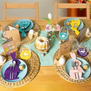 Decorative Easter bunny felt cutlery holders set in a festive spring table arrangement