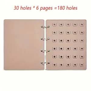 Detailed view showing the interior of a pink jewelry storage book with 180 hole capacity.