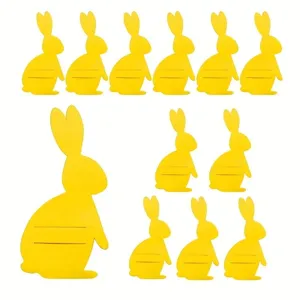 Multiple yellow felt bunny cutlery holders for Easter party tableware decoration