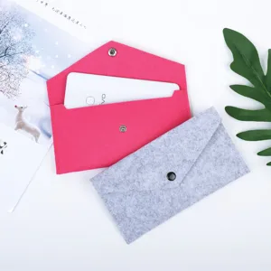 Minimalist felt envelope pouches in pink and grey for phone and accessory storage