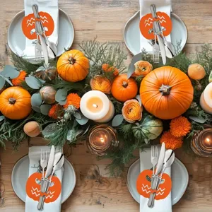 Festive Halloween table setting with pumpkin-shaped felt cutlery holders