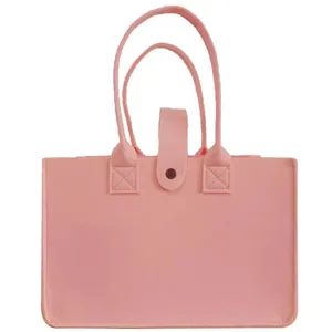Reusable pink felt tote bag for travel and home organization with snap closure