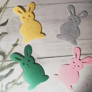 Set of 4 colorful felt bunny cutlery holders for festive Easter table decorations