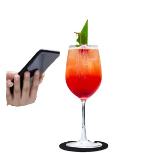Minimalist black round felt coaster for drinks, heat resistant and non-slip for home use