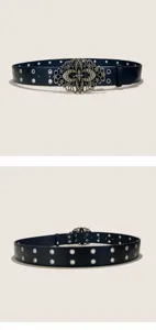 Vintage dark blue belt with ornate floral metal buckle and double eyelet design for jeans.