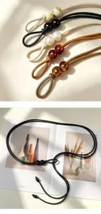 Elegante Damen Leder Taillenkette mit dekorativen Perlen, ideal für Sommerkleider und Outfits.