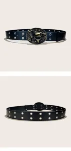 Detail of retro western black leather belt with double eyelets and vintage revolver buckle.