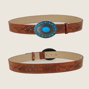Western cowboy style brown leather belt with turquoise beaded oval buckle and bull head print.