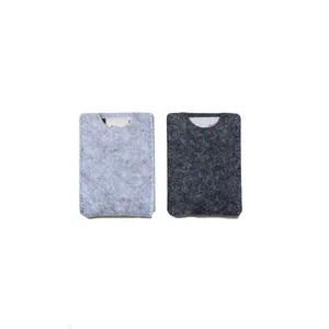 Professional minimalist felt business card holder and ID sleeve in two shades of gray.
