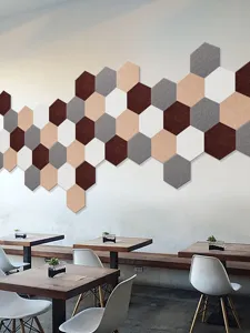 Decorative hexagonal felt wall tiles in mixed neutral colors for cafe or home office