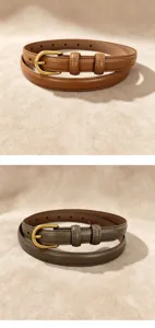 Close-up detail of genuine leather belt with retro gold buckle in camel and grey colors.