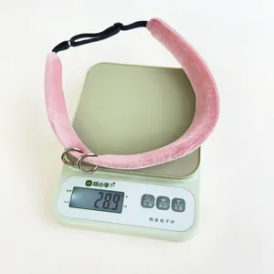 Macro view showing the 28.9g lightweight feature of the pink velvet headband with rings