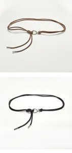 Detailed close-up view of the slim leather waist belt showing the metal ring and tips.