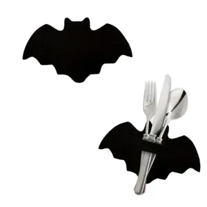 Halloween bat-shaped felt cutlery holder and placemat set on white background