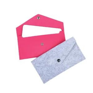 Set of two multifunctional felt storage pouches in pink and grey for eyeglasses and pens