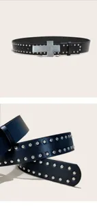 Detailed view of black leather punk rock belt with metal studs and cross buckle close-up