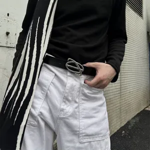 Minimalist leather belt for women featuring a unique silver metal buckle and cowhide material.