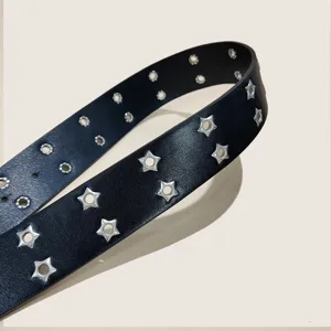 Punk style black leather belt featuring double row star eyelets, cool y2k waist accessory.