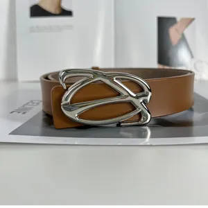 French minimalist split cowhide leather belt with chic silver metal buckle for women's daily wear.