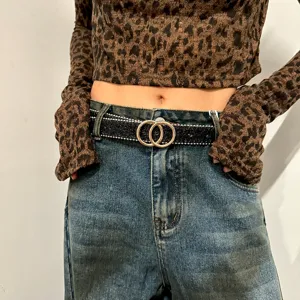 Women's fashion waist belt featuring double round metal buckle and sparkly sequin strap