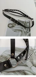 Nahaufnahme Detail des Punk Gothic PU Leder Gurtgürtels mit Metallringen Nieten und Kette.