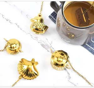 Set de infusor de té de acero inoxidable dorado, formas creativas de pato y tetera.