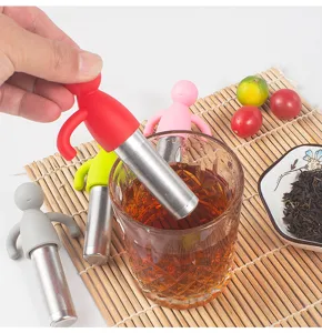 Silicone stainless steel tea infuser set, cute little man design detail scene view.