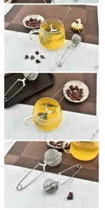 Infusor de té de acero inoxidable en bola con pinza de mango largo para té en hojas.