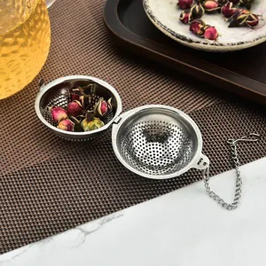 Infusore per tè in acciaio inossidabile con catenella per foglie di tè sfuse filtro.