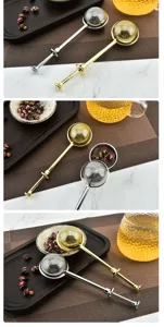 Stainless steel tea infuser detail view showing telescopic handle and fine mesh ball.
