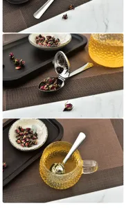 Stainless steel tea strainer infuser spoon for loose leaf tea and flower tea filtering.
