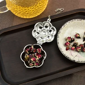 Infusor de té creativo de acero inoxidable 304 con filtro en forma de flor para té de hojas sueltas.