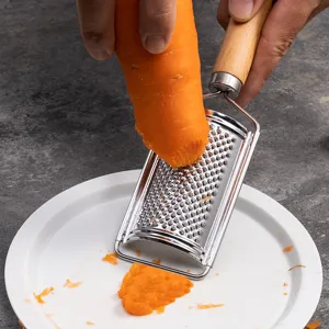 Stainless steel kitchen grater with wooden handle for grating carrots and potatoes