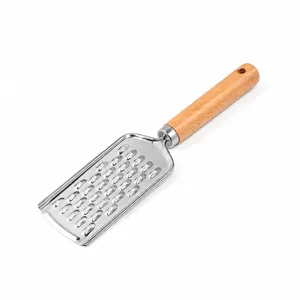 Stainless steel cheese and vegetable grater with ergonomic wooden handle for kitchen use.