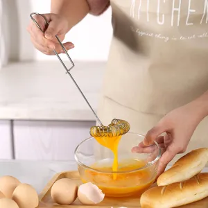 Stainless steel spring manual egg whisk kitchen baking tool for beating eggs and cream easily.