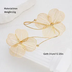 Detailed view of gold hollow filigree floral anklet, 31cm circumference jewelry