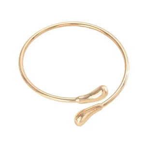 Brazalete de metal dorado ajustable estilo lava con diseño abierto de gota fundida