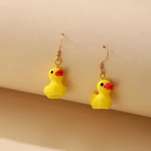 Cute yellow resin duck drop earrings with gold hooks, perfect for a playful jewelry collection