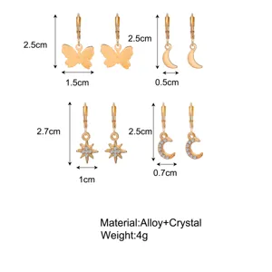 Detailed size guide for gold alloy earrings set with star and moon crystal charms.