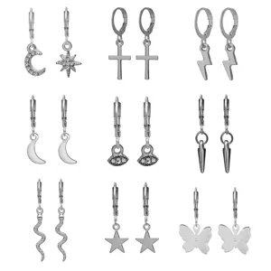 9 pairs silver-toned earring set featuring cross, moon, lightning and butterfly charms