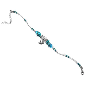 Close-up macro view of bohemian beach starfish pendant anklet with turquoise seed beads