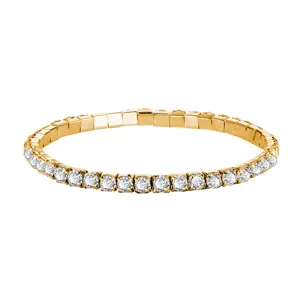 Elegant gold-tone single row crystal tennis bracelet with round sparkling stones