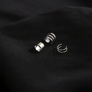 Silver non-pierced ear cuff set featuring hollow multi-layer and C-shape designs