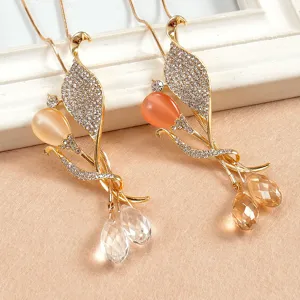 Elegant gold plated sweater chain with cat eye stone and crystal tulip pendant design