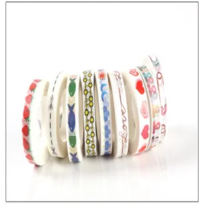 Decorative washi tape set with cute hand-painted patterns for journaling, crafts, and scrapbooking.
