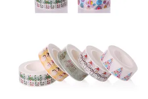 Close-up detail of Christmas washi tape featuring festive holiday patterns for crafts.