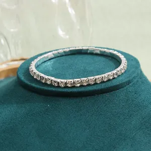 Detailed macro view of an elegant single row elastic rhinestone tennis bracelet
