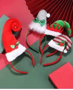 A collection of colorful festive Christmas headbands with plush elf and Santa hat designs