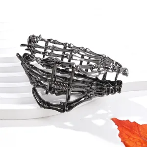 Dark metal skeleton hand hair claw clip for Halloween and gothic styling